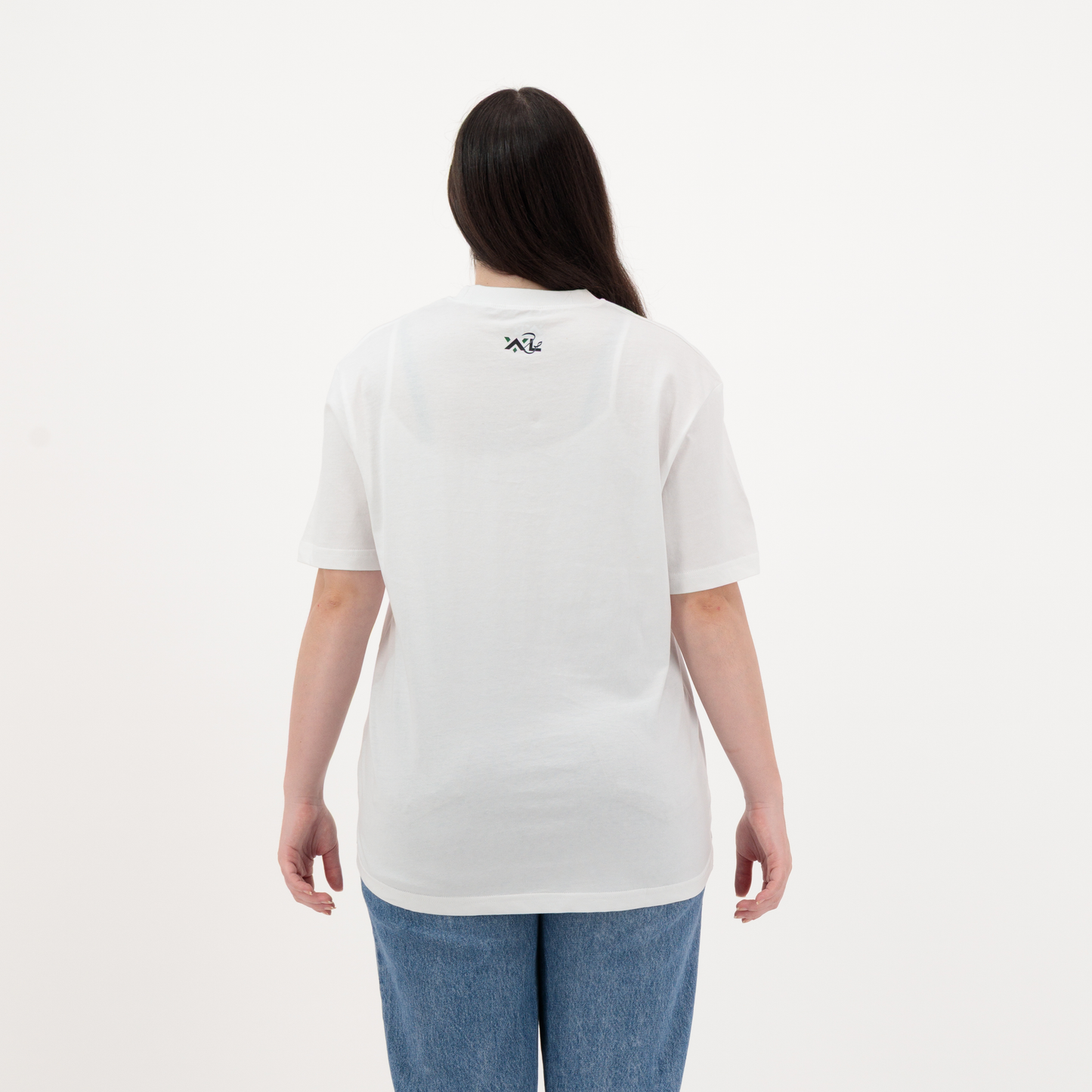 Relaxed fit women’s cotton t-shirt in oversized white style, half sleeve crew neck with unique graphic logo on the back side.